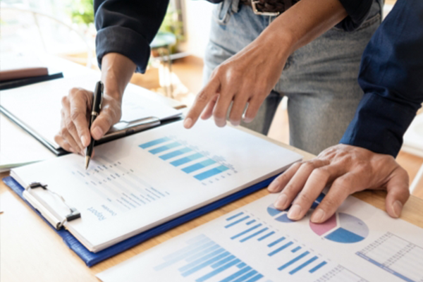 two people discussing an audit